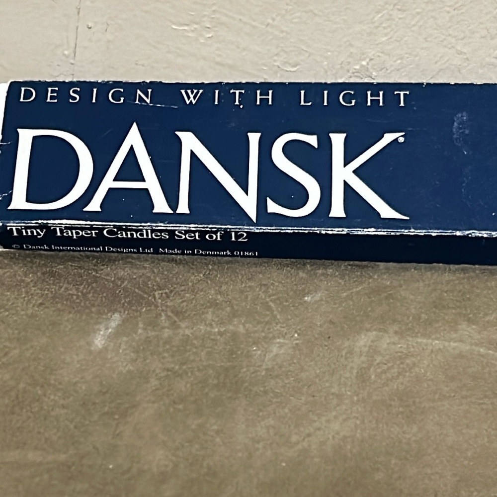Set of 12 Dansk Deaign tiny taper candles.
